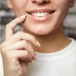 Confident smile after full cosmetic smile makeover in Rowlett, TX